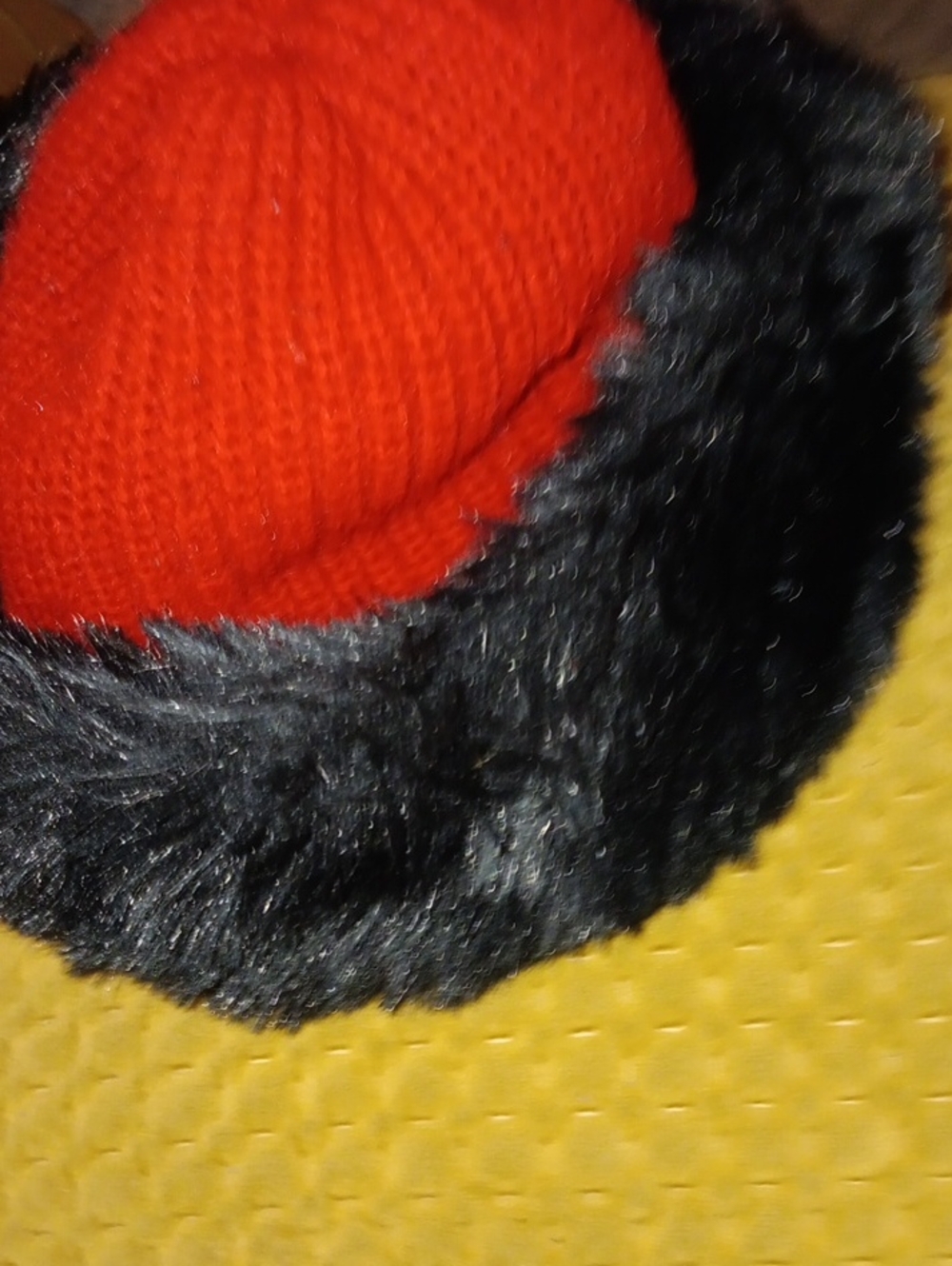 isotoner Red Knit Hat with Black Faux Fur Trim